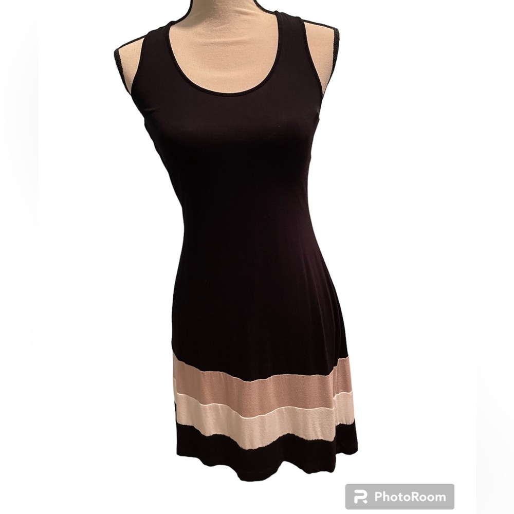Calvin Klein dress. Black. Size 4. Pretty racerback detail. Color block bottom.